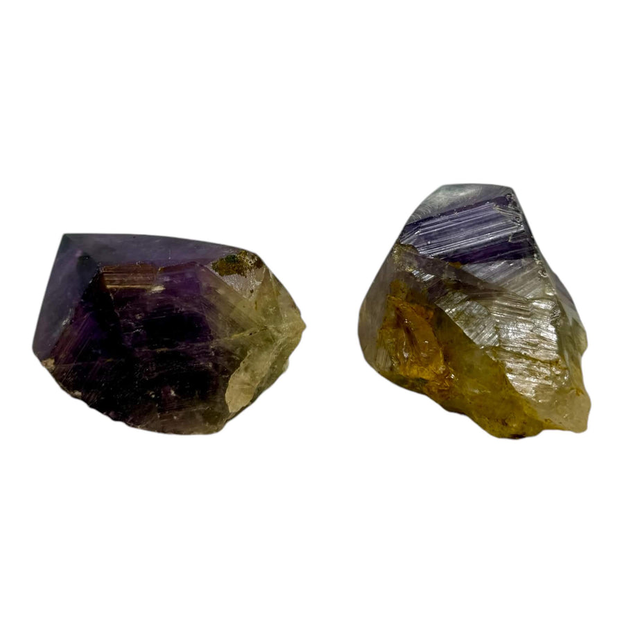 Set of two Amethyst Free Form crystals (2" x 2"), featuring deep purple hues and a smooth, polished finish. A unique Amethyst carving symbolizing intuition, peace, and emotional balance. Perfect for meditation, energy healing, and spiritual decor.