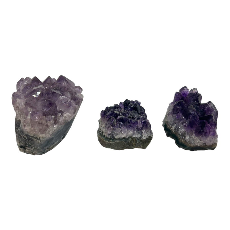 Natural Amethyst Cluster (3" x 2"), featuring vibrant purple crystal formations and raw, untouched beauty. A unique Amethyst Free Form that promotes relaxation, energy cleansing, and spiritual protection. Perfect for meditation, home decor, and crystal healing.